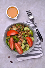 Salad slices of raw vegetables with lentils