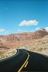 Vertical view of the open countryside road and the surrounding mountain