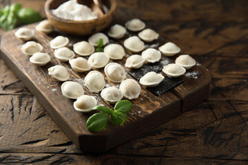 Traditional homemade dumplings on a wooden desk
