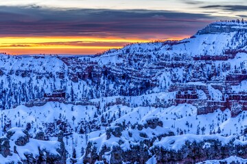 Beautiful view of snowy rock formations at sunrise in Bryce Canyon National Park. Utah, USA.