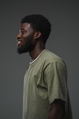 Fototapeta premium Studio shot of isolated on grey background black man dressed in casual attire.