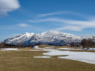 Snow covered mountains in spring,Helgeland coast,Norway