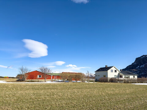 Farm landscape with a house in the background,Helgeland coast,Norway