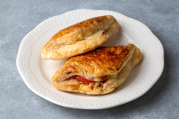 Tomato Cheese Pie. Boyoz with tomato and cheese from traditional Turkish cuisine. Turkish name; domatesli boyoz.