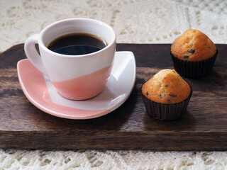 Cup of coffee and two muffins