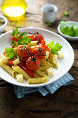 Pasta with baked tomatoes and cheese