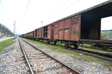 Fototapeta na wymiar Train on Railway tracks. A freight car at a railway station. Transportation. Goods Wagon.