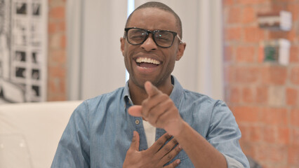 Obraz premium Portrait of Laughing African Man, Having Good Time