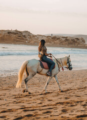 Sunset over Devil's Rock at Surfer Point in Tamraght, Morocco