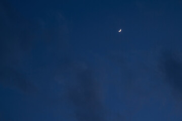 Obraz na płótnie Canvas Nightly sky with moon. A photo with a calm mood. High quality photo