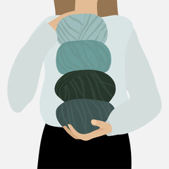 The woman with coloured knitted wool. Cold blue and green colours.