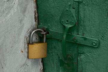 lock on the door of an old farmhouse. High quality photo
