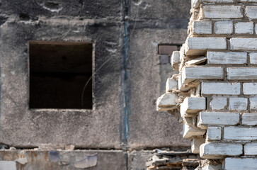window of a burnt and destroyed house in Ukraine