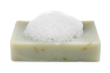 Soap bar with fluffy foam on white background