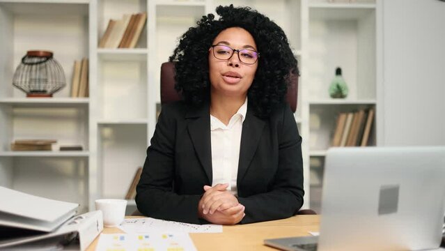 Camera view of confident employer looking at camera and talking with job candidate for vacant position with negative result at office workplace Bad interview and unsuccessful recruitment concept