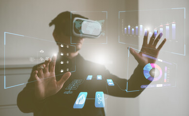data analysis concept. man wearing VR glasses working with virtual data charts