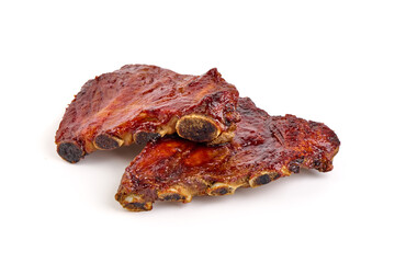 Delicious spicy marinated ribs in a bbq or tomato sauce, isolated on a white background.