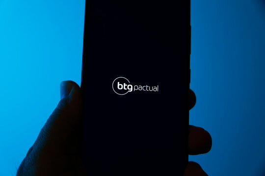 illustrative image of BTG Pactual on the cell phone screen