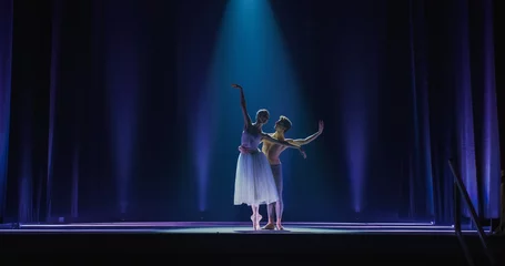 Fotobehang Dansschool Cinematic Wide Shot of the Stage: Two Young Classical Ballet Dancers Performing in Theatre. Professional Male and Female Performers Rehearse their Choreography Together Before the show