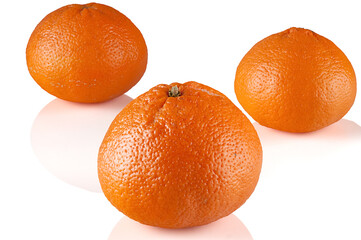 three large ripe tangerines