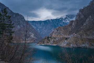 Beautiful mountain landscape, lake with blue water in the gorge in spring. Canyon Pluzhine, travel to Montenegro