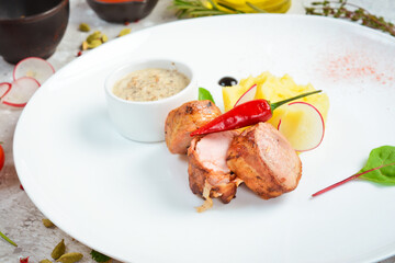 Fried sausage and mashed potatoes with sauce on a plate. Top view. Free space for text.