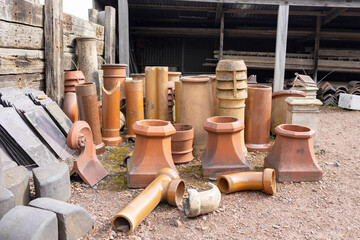 Chimney pots in a salvage yard