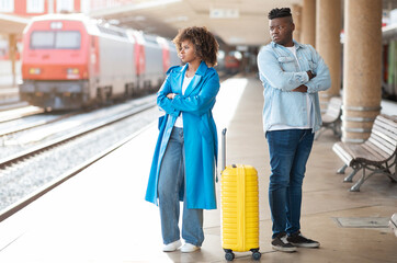 Relationship Crisis. Offended Black Couple Standing On Platform At Railway Station