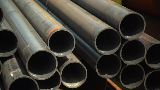 Stainless steel pipes lie in the finished product warehouse at the rolled steel mill