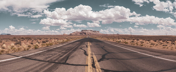 State Route 98 in Coconino County of northern Arizona, USA. Empty desert road with the LeChee Rock...