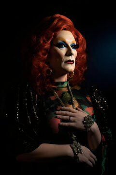 older drag queen, heartbroken on black background, made with generative ai