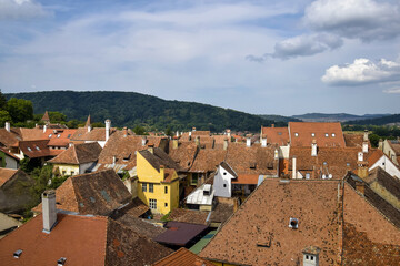 Towers and rooftops of medieval city of Sighishoara in Transylvania, Romania. Sighisoara old town...