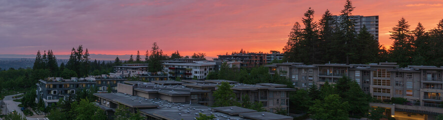 Fototapeta na wymiar Sunset over BC suburban residential community of UniverCity Highlands on Burnaby Mountain.