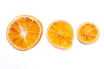Top view of dried orange slices isolated on a white background. Flat lay.