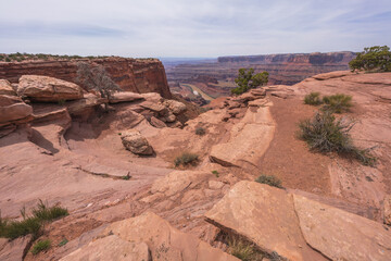 hiking the dead horse trail in dead horse point state park in utah, usa