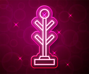 Glowing neon line Coat stand icon isolated on red background. Vector