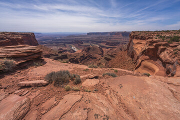 hiking the dead horse trail in dead horse point state park in utah, usa