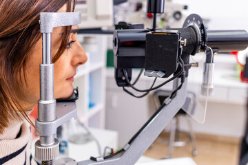 Young woman at her eye check-up examination