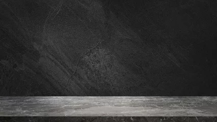 Fotobehang empty grey marble tabletop with dark black cement stone background for product displayed in rustic mood and tone. luxury background for product stand with empty copy space for party, promotion. © WONGSAKORN