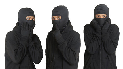 Mysterious thief man wearing black hoodie and mask was caught while sneaking around. Shocked and frightened criminal. Isolated image on gray background