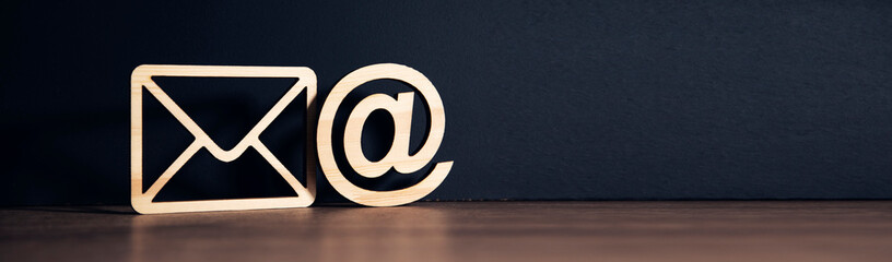 wooden letter with email sign.