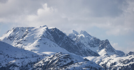 Fototapeta na wymiar Tantalus Range Mountain covered in Snow. Canadian Landscape Nature Background. Squamish, BC, Canada.