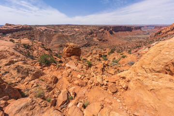 hiking the syncline loop trail in island in the sky district of canyonlands national park, utah, usa