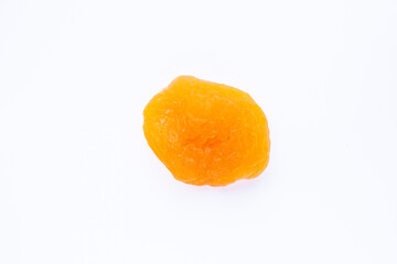 Dried apricot isolated on a white background. Top view, flat lay.