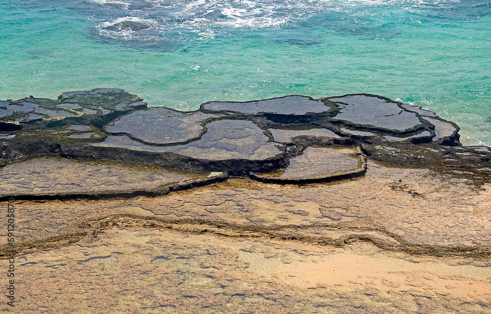 Sticker natural pools in praia leao, island of noronha - brazil