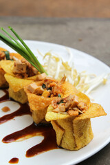 Pad Thai - Thai fusion food - Stir fried rice noodles on white ceramic plate