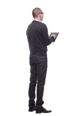 Back view of businessman writing on a clipboard