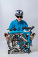 Gennevilliers, France - 04 10 2023: Studio shot detail of a woman dressed in a blue polo shirt,...