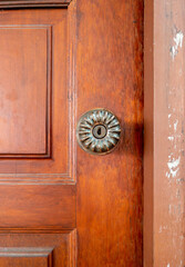 The brass door knob in the retro style.