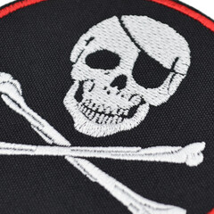 Embroidered patch depicting a skeleton, skull, death. Accessory for metalheads, punks, rockers, bikers, satanists, emo, street aggressive subcultures. Pirates style.